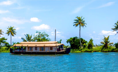 brown house boat in water in alleppey kerala